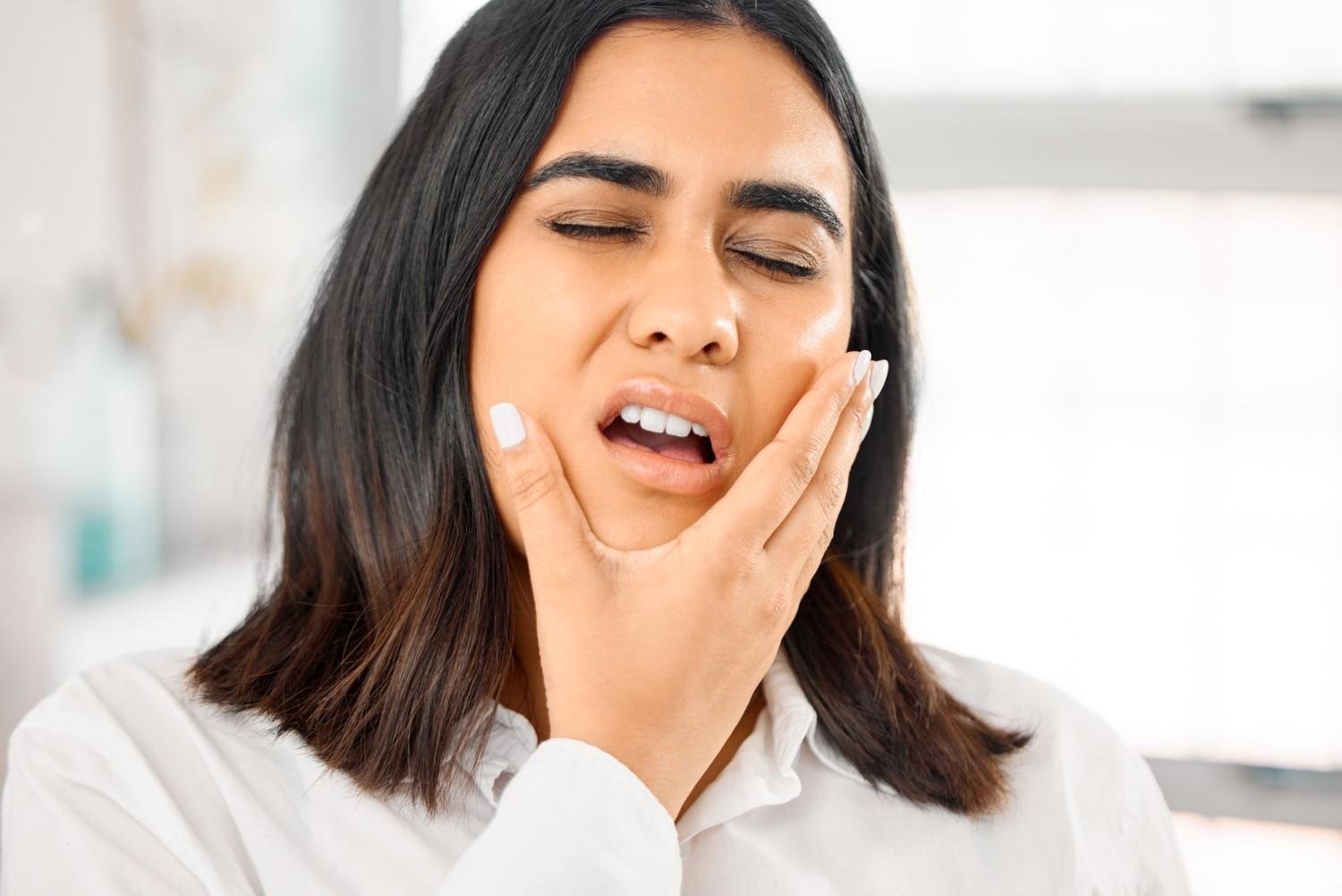 Swelling around the jaw or cheek may signal infection